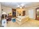 Inviting living room with comfortable seating and built-in shelving at 120 Lyndhurst Way, Sharpsburg, GA 30277