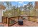 View from back deck overlooking fenced in yard with firepit and sitting area at 195 Blackberry Run, Fayetteville, GA 30214