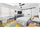 Bedroom with a ceiling fan, double sliding closet door and a sunny window at 195 Blackberry Run, Fayetteville, GA 30214