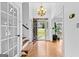 Bright foyer with hardwood floors and a view of the front yard at 195 Blackberry Run, Fayetteville, GA 30214