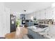 Spacious kitchen with granite countertops and stainless steel appliances at 195 Blackberry Run, Fayetteville, GA 30214