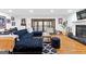 Cozy living room with large sectional sofa and fireplace at 195 Blackberry Run, Fayetteville, GA 30214