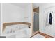 Relaxing main bathroom featuring a luxurious bathtub and a walk-in shower at 195 Blackberry Run, Fayetteville, GA 30214