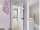 Hallway with view into living room and bedroom at 215 Sheridan Ln, Peachtree City, GA 30269