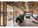 Expansive unfinished basement with exposed insulation and framing, presenting a blank canvas for future development at 215 Sheridan Ln, Peachtree City, GA 30269