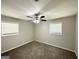 Bedroom with carpeted floors and large windows at 6507 Jackie Ln, Austell, GA 30106