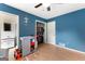 bedroom featuring access to the bathroom, changing table, and a large closet at 270 Lake Cir, Fayetteville, GA 30215
