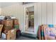 View through doorway of garage with boxes and exterior door at 270 Lake Cir, Fayetteville, GA 30215