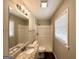 Bathroom featuring granite countertops and a shower-tub combination with updated fixtures at 5906 Pine Hurst Way, Douglasville, GA 30135