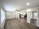 Spacious open-concept living area leads to a bright kitchen with stainless steel appliances at 5906 Pine Hurst Way, Douglasville, GA 30135