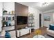 Modern living room with hardwood floors, updated furniture, and stylish decorations at 410 Queen Aliese Ln, Jonesboro, GA 30236