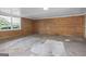 Bright unfinished basement featuring brick walls, concrete floor and natural light from the window at 115 Linda Way, Fayetteville, GA 30215