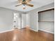 Bedroom with open doors and a view of the kitchen and closet at 115 Linda Way, Fayetteville, GA 30215