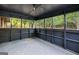 Enclosed porch with slate floors that offer a serene spot for relaxation at 115 Linda Way, Fayetteville, GA 30215