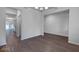 Spacious dining area with hardwood floors and an open layout, leading to other rooms in the house at 1816 Quaker St, Hampton, GA 30228