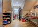 Functional attic featuring hardwood floors, storage solutions, and a bright window at 95 Weslyan Way, Oxford, GA 30054