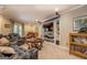 Finished basement with media center, comfortable seating, and access to the outdoors at 95 Weslyan Way, Oxford, GA 30054