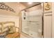 Bathroom showcasing a glass-enclosed shower with tiled walls and updated fixtures at 95 Weslyan Way, Oxford, GA 30054