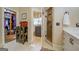 An ensuite bathroom with a walk in shower, vanity, and access to the closet at 95 Weslyan Way, Oxford, GA 30054