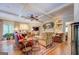 Spacious living room features coffered ceilings, hardwood floors, and a charming fireplace at 95 Weslyan Way, Oxford, GA 30054