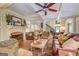 Comfortable living room featuring a fireplace, coffered ceiling and elegant furnishings at 95 Weslyan Way, Oxford, GA 30054