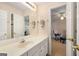 Bright bathroom featuring long vanity and access to the bedroom at 5 Renfroe Ct, Decatur, GA 30030