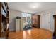 Bedroom featuring wood floors, large window, and workout equipment at 5 Renfroe Ct, Decatur, GA 30030