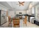 Bright kitchen featuring granite countertops, an island and stainless steel appliances at 5 Renfroe Ct, Decatur, GA 30030