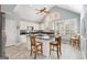 Bright kitchen featuring granite countertops, an island and stainless steel appliances at 5 Renfroe Ct, Decatur, GA 30030
