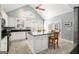 Bright kitchen featuring granite countertops, an island and stainless steel appliances at 5 Renfroe Ct, Decatur, GA 30030