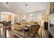 Spacious living room with fireplace, hardwood floors, and views of the dining and kitchen areas at 5 Renfroe Ct, Decatur, GA 30030