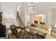 Open living area with staircase, hardwood floors, and a view into the dining room at 5 Renfroe Ct, Decatur, GA 30030