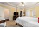 Bedroom with tray ceiling, carpet floors, closet and ensuite bathroom access at 5 Renfroe Ct, Decatur, GA 30030