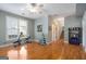 Workout room features wood floors, ceiling fan, and exercise equipment at 5 Renfroe Ct, Decatur, GA 30030