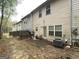 Backyard featuring a patio, fence, and outdoor equipment for a relaxing outdoor space at 1255 Chinon Pt, Lithonia, GA 30058
