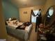 Bedroom featuring a coordinated bed set and natural light from the window at 1255 Chinon Pt, Lithonia, GA 30058
