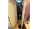 Walk-in closet for storing many clothing items in a bedroom at 1255 Chinon Pt, Lithonia, GA 30058