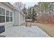 Backyard concrete patio area with grill at 131 Meadowbrook Ln, Grantville, GA 30220