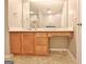 Bathroom featuring a spacious vanity with a storage cabinet, a shower, and neutral tile flooring at 131 Meadowbrook Ln, Grantville, GA 30220