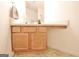 Bathroom featuring a vanity with cabinet storage at 131 Meadowbrook Ln, Grantville, GA 30220