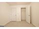 Bedroom featuring carpet, standard closet, and electrical outlets at 131 Meadowbrook Ln, Grantville, GA 30220