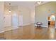 Spacious living room with hardwood floors, high ceilings, and easy access to the kitchen at 131 Meadowbrook Ln, Grantville, GA 30220