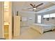Main bedroom features a ceiling fan and adjoining bathroom at 131 Meadowbrook Ln, Grantville, GA 30220