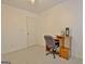 Office space featuring carpeted floors, a desk, and a neutral wall color at 131 Meadowbrook Ln, Grantville, GA 30220