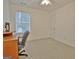 Office space with carpeted floors, a desk, and a window with natural light at 131 Meadowbrook Ln, Grantville, GA 30220
