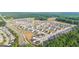 Aerial view of the community showing the layout of homes, roads, and green spaces at 1817 Quaker St, Hampton, GA 30228