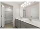 Bathroom featuring double vanity and framed mirror at 1817 Quaker St, Hampton, GA 30228