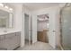 Bright bathroom with walk-in closet and open bedroom view at 1817 Quaker St, Hampton, GA 30228