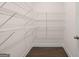 Walk-in closet with multiple levels of shelving at 1817 Quaker St, Hampton, GA 30228