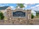 Stone entrance sign for The Gates at Pates Creek community with a fountain at 1817 Quaker St, Hampton, GA 30228